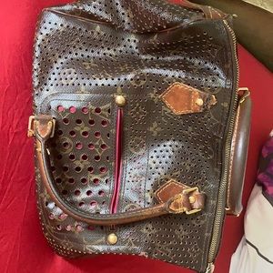 Perforated Louis Vuitton bad LIMITED EDITION